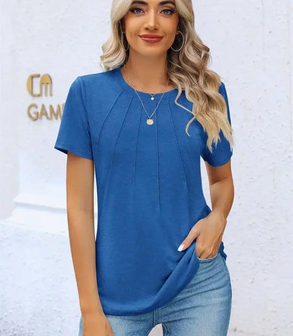 Blusa Feminina Básica Plissada em tecido confortável com pregas frontais, mangas curtas e decote redondo. Blusa Feminina Básica Plissada em tecido confortável com pregas frontais, mangas curtas e decote redondo.