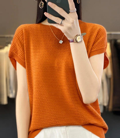 Blusa feminina em tricot texturizado sem costura, confortável e elegante, ideal para trabalho e lazer. Blusa feminina em tricot texturizado sem costura, confortável e elegante, ideal para trabalho e lazer.