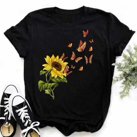 Camiseta feminina estampada com girassol e frases inspiradoras, feita de algodão com corte reto e mangas curtas, ideal para looks casuais. Camiseta feminina estampada com girassol e frases inspiradoras, feita de algodão com corte reto e mangas curtas, ideal para looks casuais.