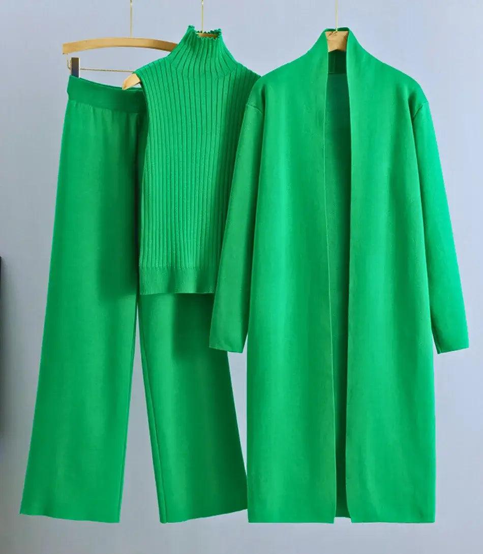 Mulher vestindo Conjunto Comfy Feminino de Lanzinha 3 peças com casaco longo, colete de gola alta e calça de cintura alta, ideal para outono e primavera. - Anellimn Mulher vestindo Conjunto Comfy Feminino de Lanzinha 3 peças com casaco longo, colete de gola alta e calça de cintura alta, ideal para outono e primavera. - Anellimn