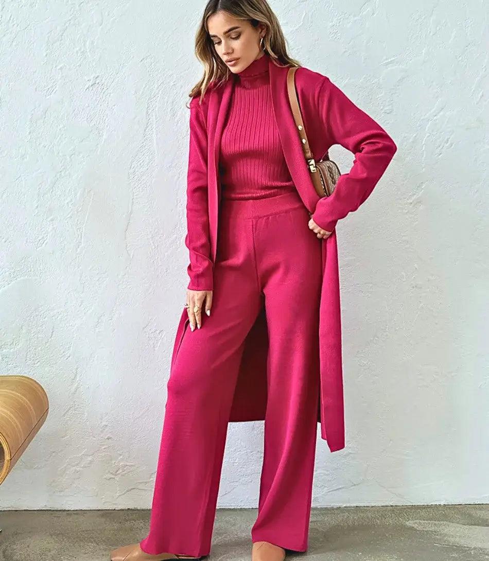 Mulher vestindo Conjunto Comfy Feminino de Lanzinha 3 peças com casaco longo, colete de gola alta e calça de cintura alta, ideal para outono e primavera. - Anellimn Mulher vestindo Conjunto Comfy Feminino de Lanzinha 3 peças com casaco longo, colete de gola alta e calça de cintura alta, ideal para outono e primavera. - Anellimn