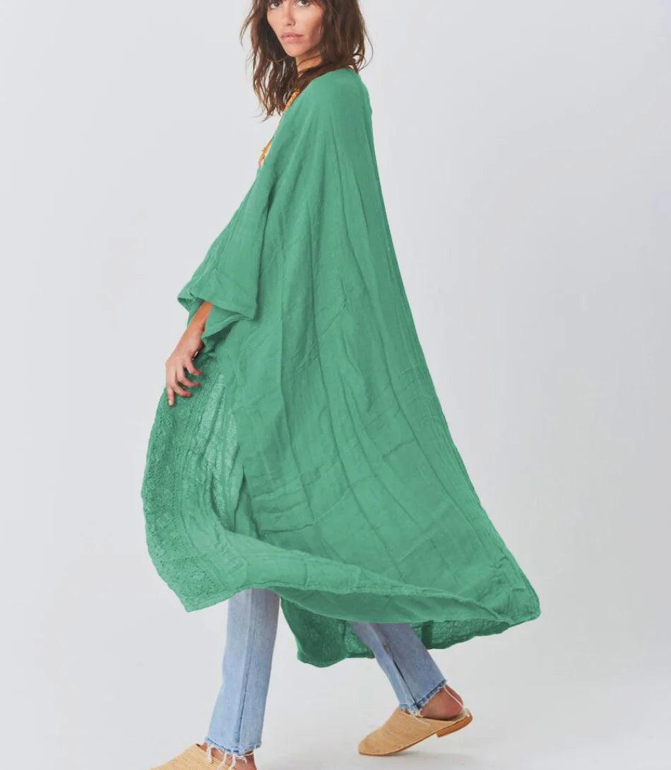 Kimono longo boho feminino em poliéster e algodão com detalhes em renda, estilo casual e sofisticado, ideal para combinações elegantes. Kimono longo boho feminino em poliéster e algodão com detalhes em renda, estilo casual e sofisticado, ideal para combinações elegantes.