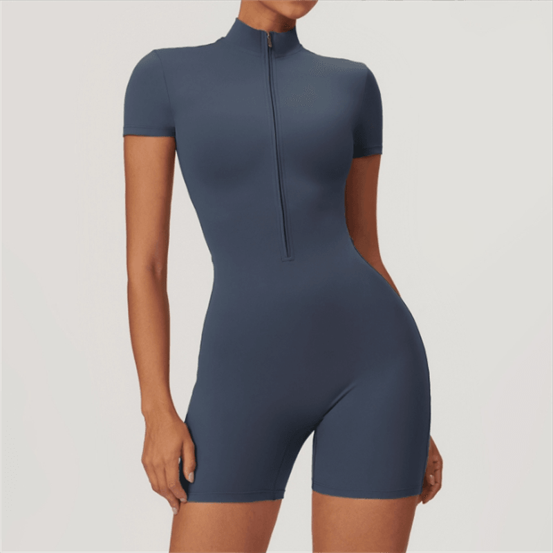 Macaquinho Fitness feminino com mangas longas e zíper frontal, ajuste perfeito para atividades como yoga e musculação. Azul Macaquinho Fitness feminino com mangas longas e zíper frontal, ajuste perfeito para atividades como yoga e musculação. Azul