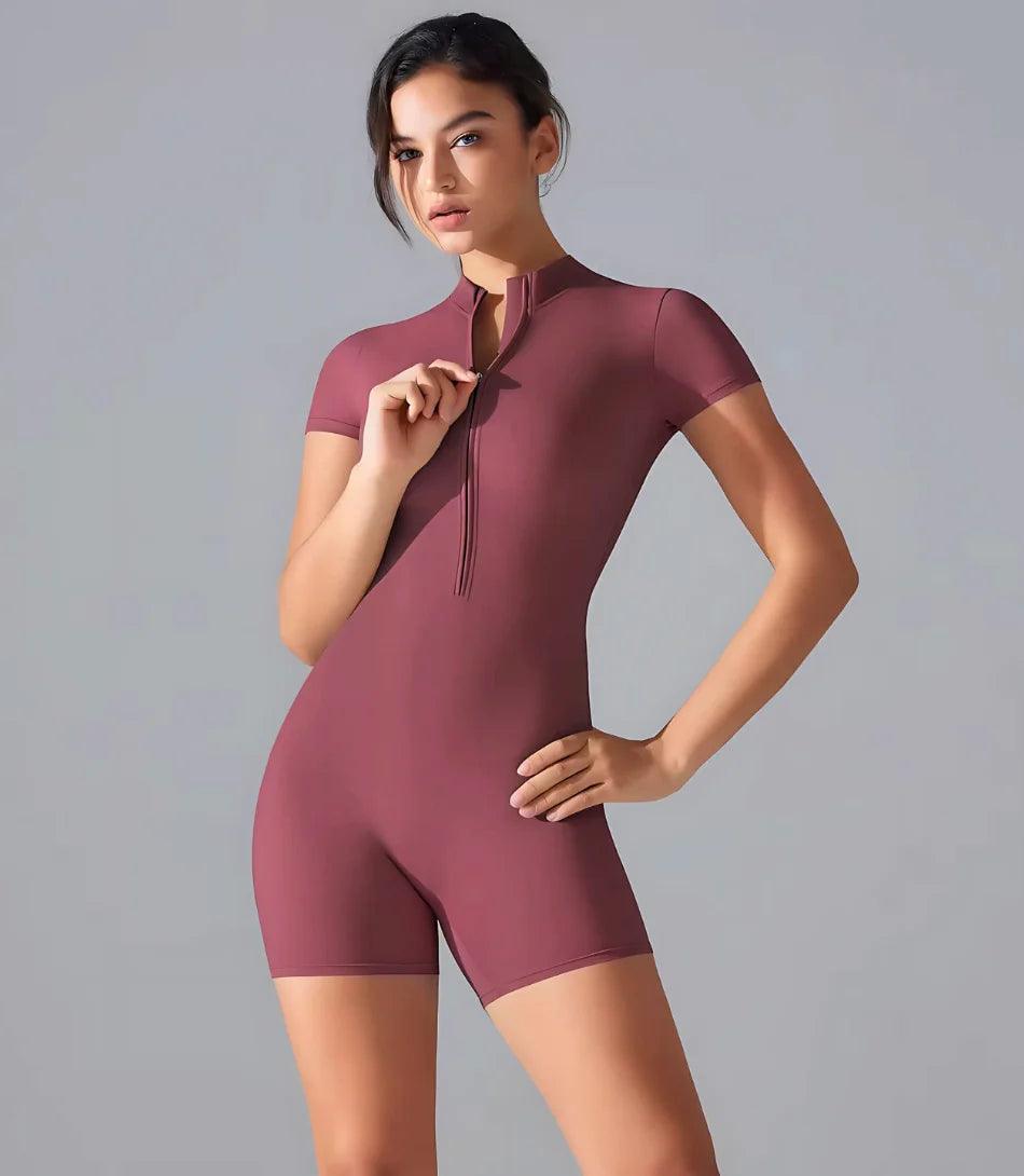 Macaquinho Fitness feminino com mangas longas e zíper frontal, ajuste perfeito para atividades como yoga e musculação. rosa Macaquinho Fitness feminino com mangas longas e zíper frontal, ajuste perfeito para atividades como yoga e musculação. rosa