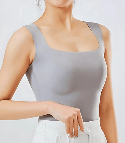 Regata Feminina Básica com Bojo Interno Sem Costura, ajustada, confortável e de tecido macio para uso casual ou trabalho. Regata Feminina Básica com Bojo Interno Sem Costura, ajustada, confortável e de tecido macio para uso casual ou trabalho.