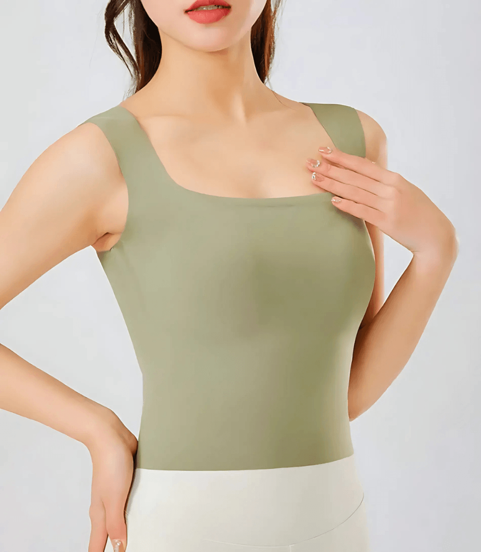 Regata Feminina Básica com Bojo Interno Sem Costura, ajustada, confortável e de tecido macio para uso casual ou trabalho. Regata Feminina Básica com Bojo Interno Sem Costura, ajustada, confortável e de tecido macio para uso casual ou trabalho.