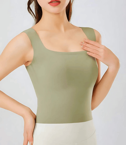 Regata Feminina Básica com Bojo Interno Sem Costura, ajustada, confortável e de tecido macio para uso casual ou trabalho. Regata Feminina Básica com Bojo Interno Sem Costura, ajustada, confortável e de tecido macio para uso casual ou trabalho.