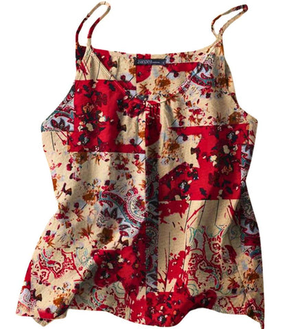 Regata Feminina Estampada com Alça Fina em tecido leve e design vibrante, ideal para dias de verão. Regata Feminina Estampada com Alça Fina em tecido leve e design vibrante, ideal para dias de verão.