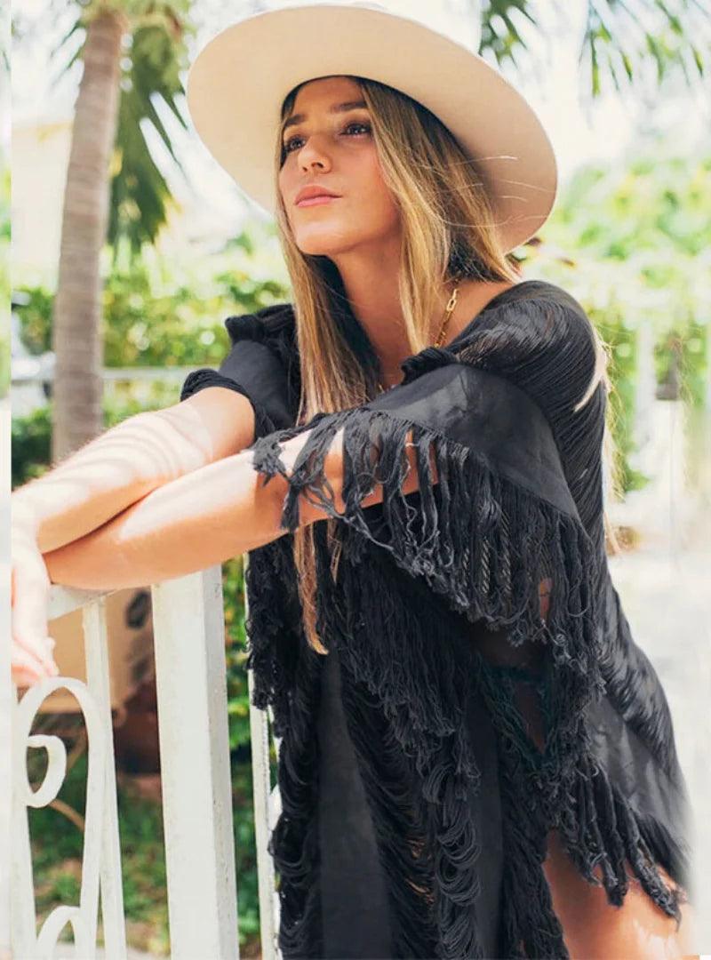 Saída de Praia Longa: O melhor look para suas férias à beira-mar. Saída de Praia Longa: O melhor look para suas férias à beira-mar.