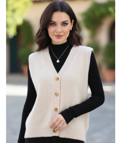 Comprar colete feminino em tricot com gola V e botões, ideal para sobrepor looks elegantes de outono e inverno em promoção ZARA
 Comprar colete feminino em tricot com gola V e botões, ideal para sobrepor looks elegantes de outono e inverno em promoção ZARA