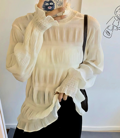 Blusa feminina gola alta e mangas bufantes, sofisticada e elegante