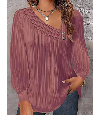 Blusa feminina plissada com botões no ombro, design elegante, mangas bufantes e decote assimétrico, ideal para looks sofisticados.