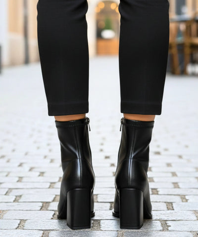 Comprar bota feminina cano curto de couro com salto grosso e zíper traseiro para looks elegantes e confortáveis no inverno barato DAFITI  
