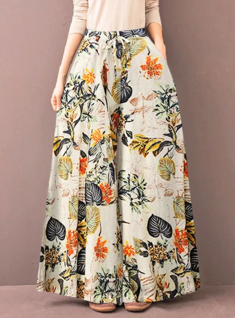 Calça pantalona feminina floral em algodão premium. Estampa elegante para looks casuais ou diários.