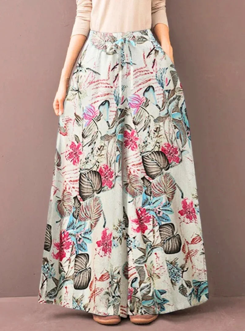 Calça pantalona feminina floral em algodão premium. Estampa elegante para looks casuais ou diários.