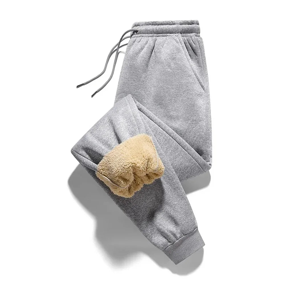 Calça térmica masculina flanelada de lã de cordeiro, ajuste confortável com cordão, ideal para o inverno.