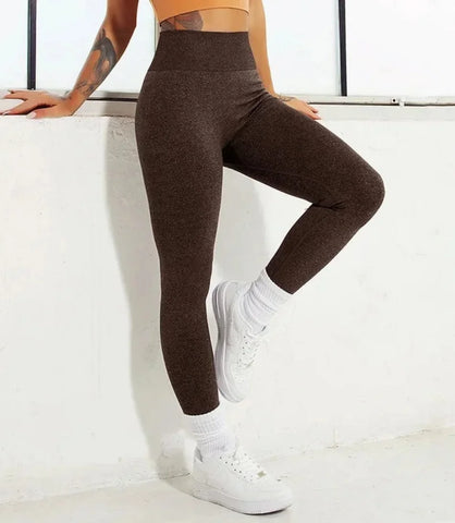 Calça academia feminina cintura alta scrunch em tecido anti-celulite, modelagem push-up e ajuste confortável.