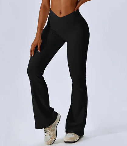 Calça flare cintura alta para academia e yoga, tecido leve e elástico, cós reforçado, ideal para atividades físicas e looks casuais.