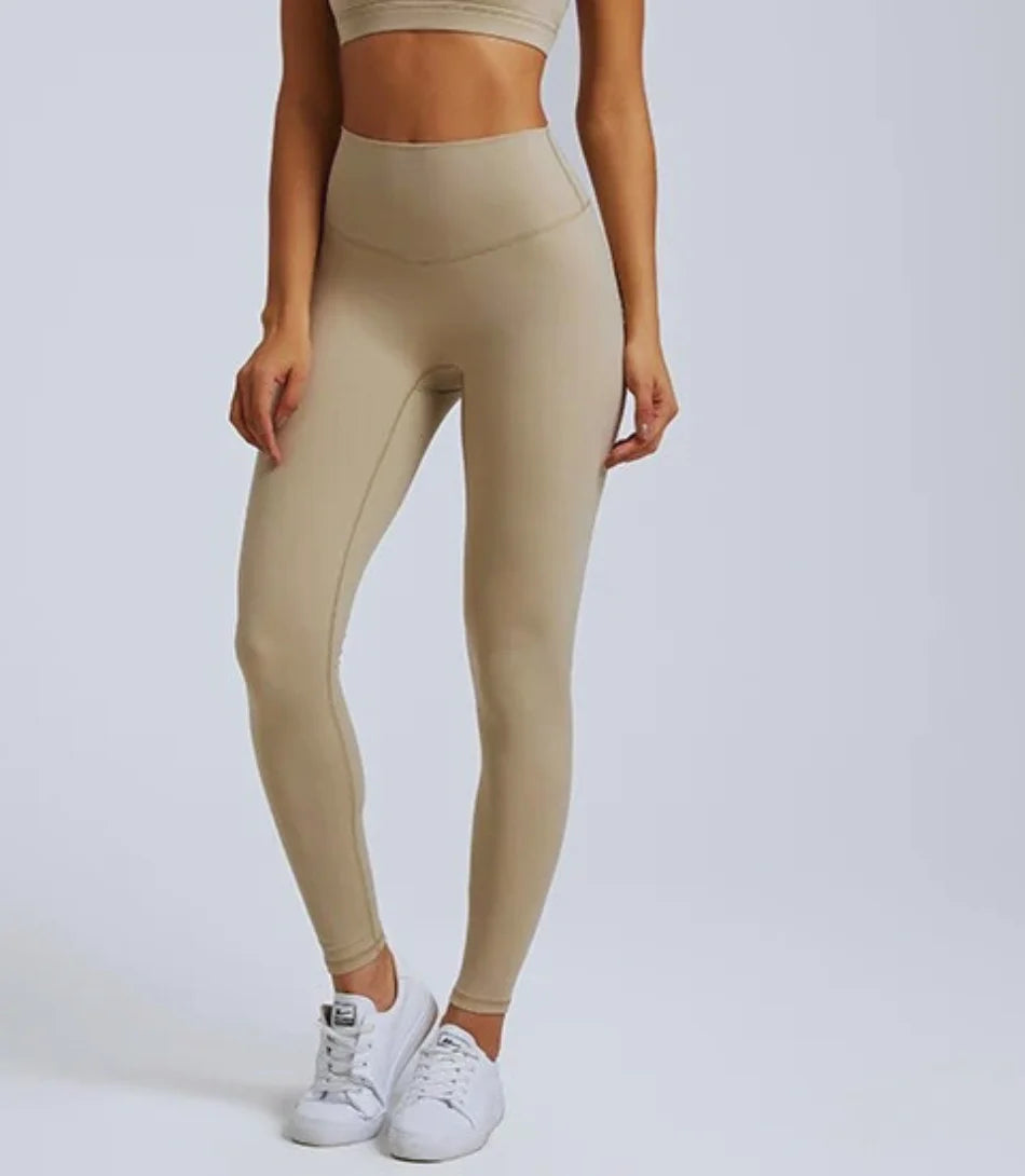 Calça legging acadeAmia cintura alta compressão, tecido de nylon, alta elasticidade, ajuste perfeito, design seamless, ideal para treinos e uso casual.