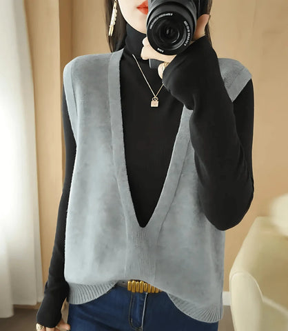 Colete feminino de tricot com gola V, estilo básico, ideal para sobreposições em looks formais e casuais, confortável e elegante.