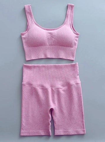 Conjunto de Roupa Fitness Feminino: Malha canelada para conforto e estilo. Ideal para atividades esportivas e uso diário.