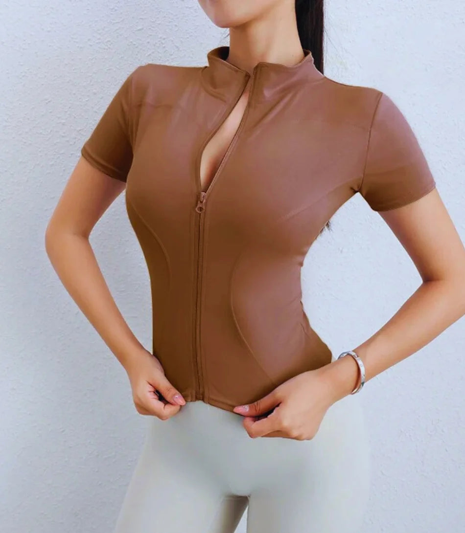 Jaqueta feminina para academia slim fit, tecido respirável, ajuste perfeito e manga longa com furos para polegares.