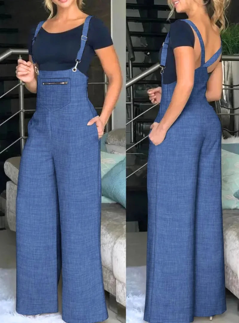 Macacão feminino suspenso em Jean. Estilo casual, pernas largas e ajustáveis. Conforto e elegância em um design moderno.