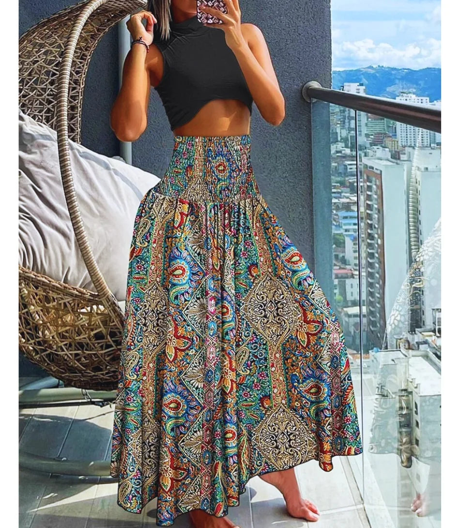 Saia longa boho feminina estampada com cintura alta, estilo leve e fluido, ideal para o verão e ocasiões casuais.