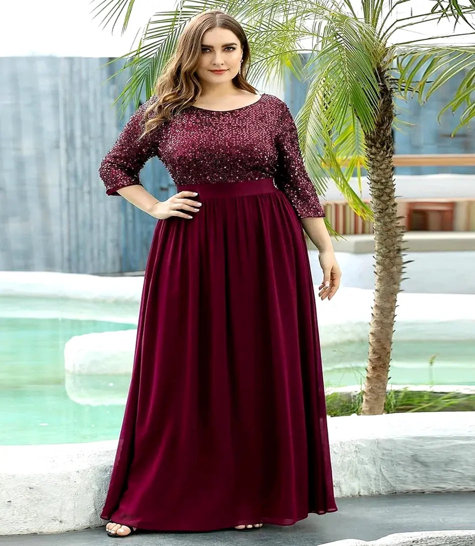 Vestido Festa Longo Plus Size Elegante com renda e paetês, mangas 3/4, perfeito para eventos formais como casamentos e festas de gala.