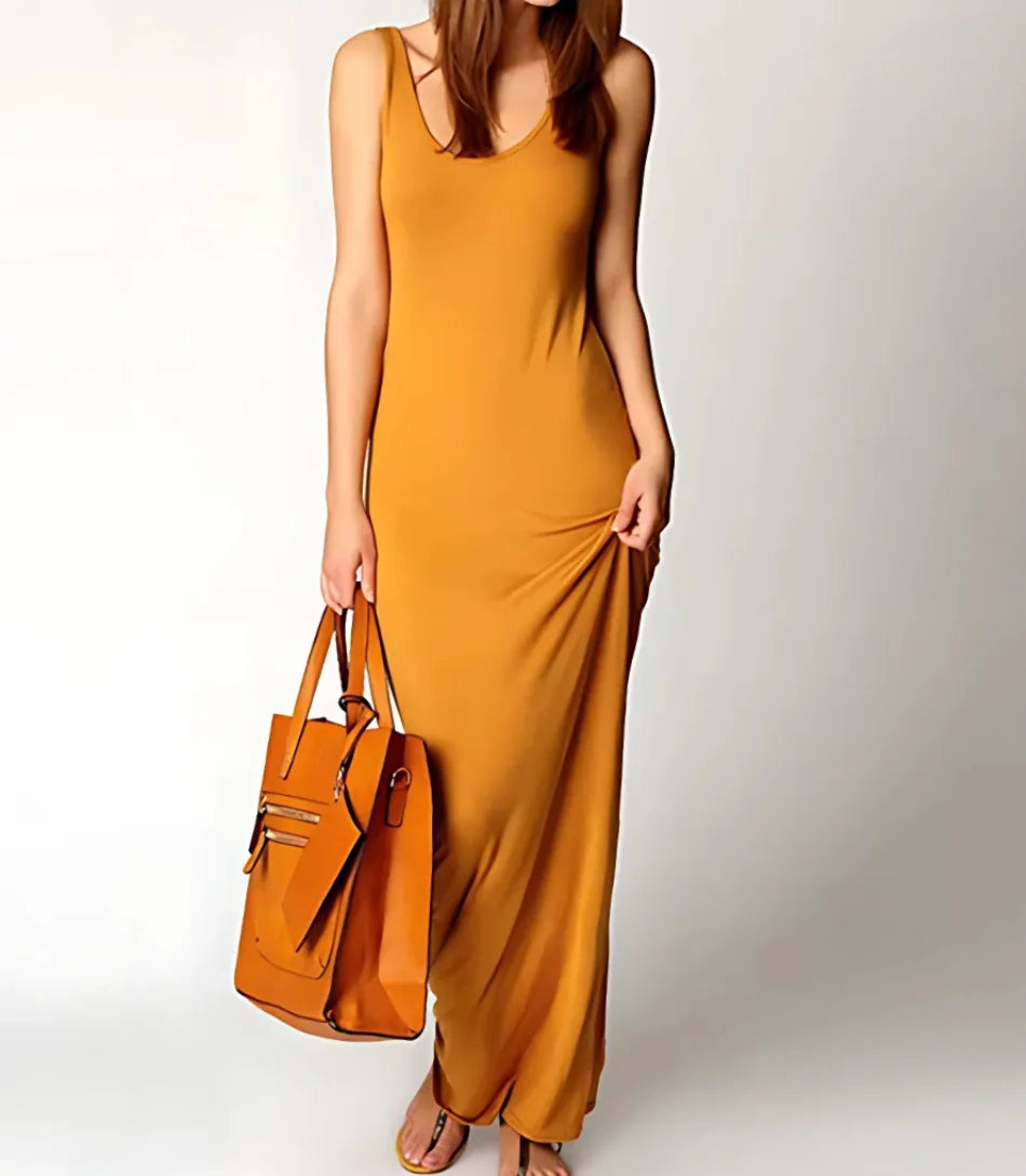 Vestido Longo Casual de Algodão Confortável Amarelo Mostarda Sem Mangas com tecido leve, corte reto e design minimalista, ideal para o dia a dia e momentos de lazer.