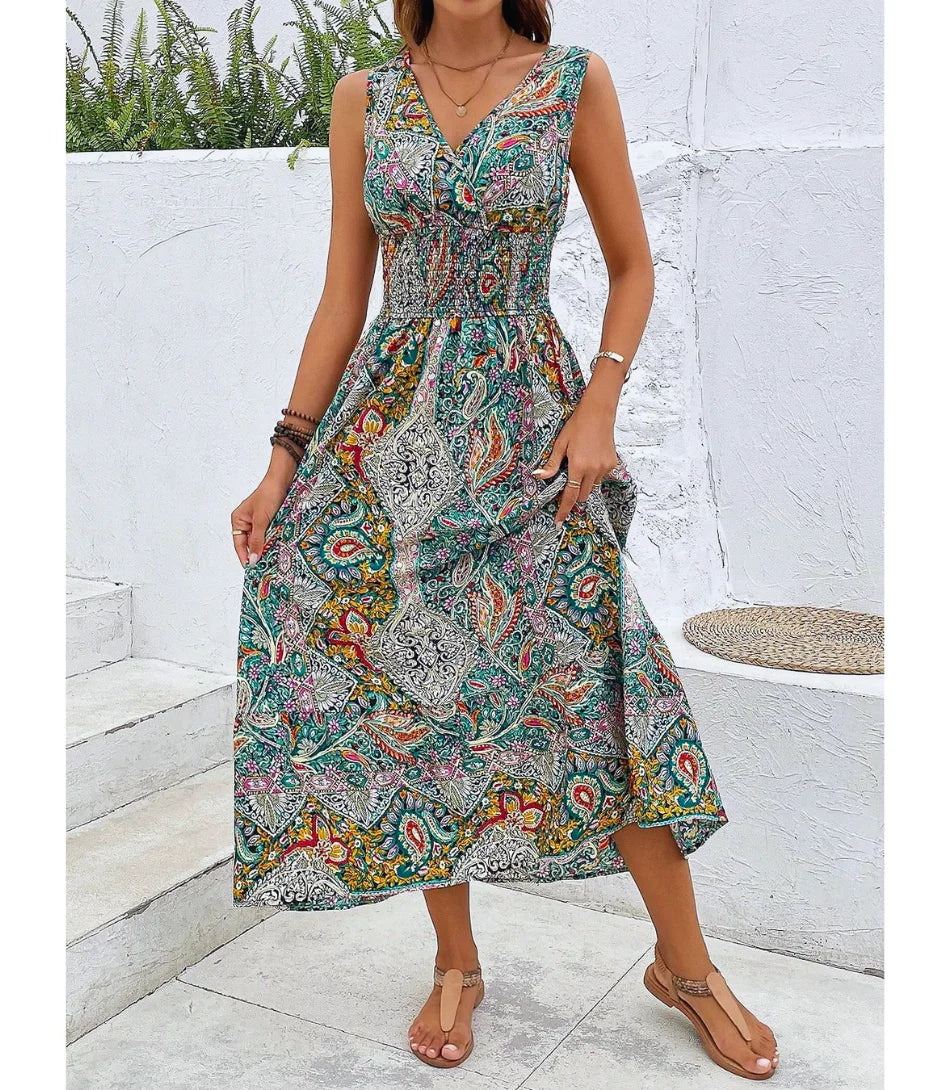 Vestido longo boho feminino com estampa floral vibrante, decote em V e corte evasê, perfeito para ocasiões casuais e elegantes.