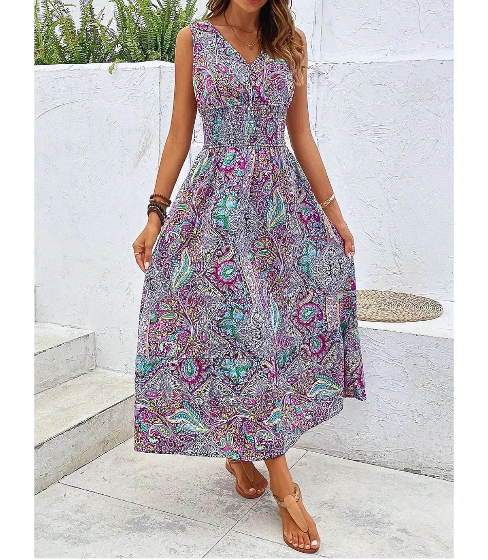 Vestido longo boho feminino com estampa floral vibrante, decote em V e corte evasê, perfeito para ocasiões casuais e elegantes.