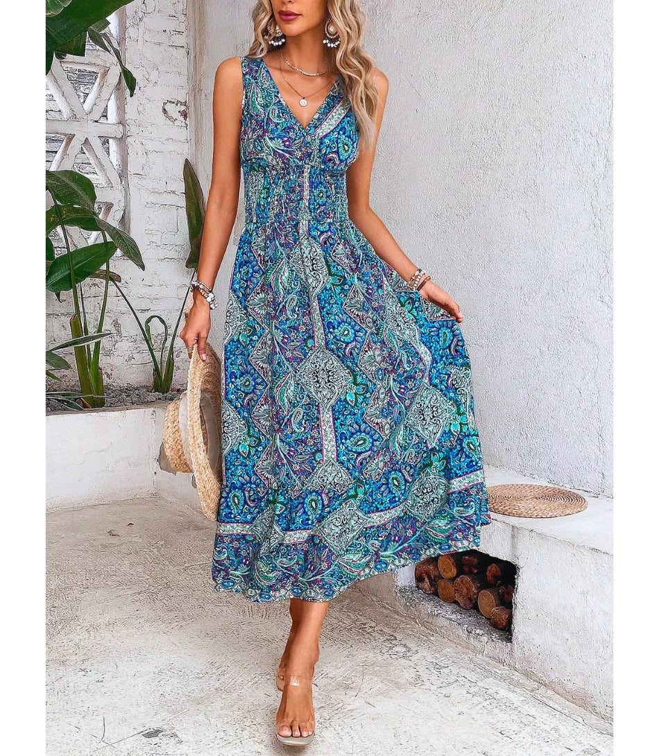 Vestido longo boho feminino com estampa floral vibrante, decote em V e corte evasê, perfeito para ocasiões casuais e elegantes.