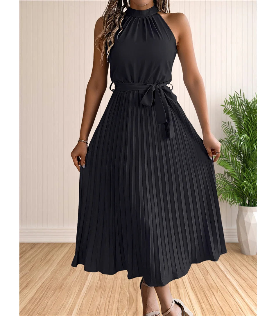 Vestido midi feminino plissado com gola alta, cinto ajustável e fenda lateral, disponível em tamanhos P a GG, ideal para looks elegantes e versáteis.