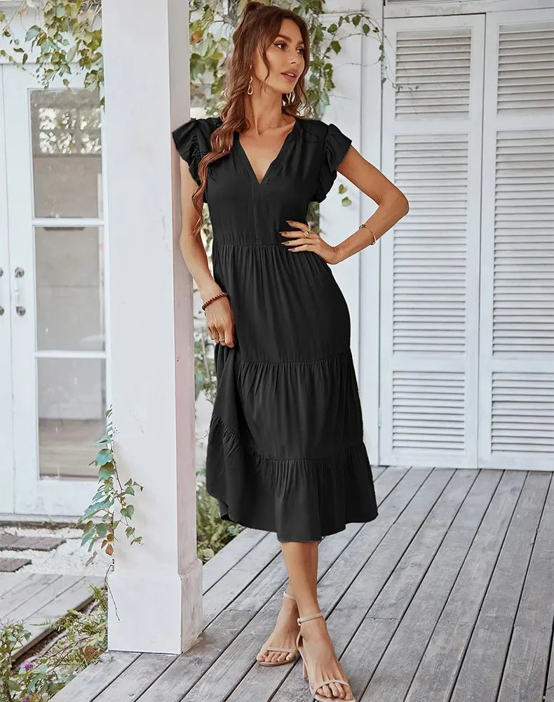 Vestido Midi Soltinho: Design floral, poliéster leve, conforto e estilo. Ideal para festas, encontros e praia. Adquira já