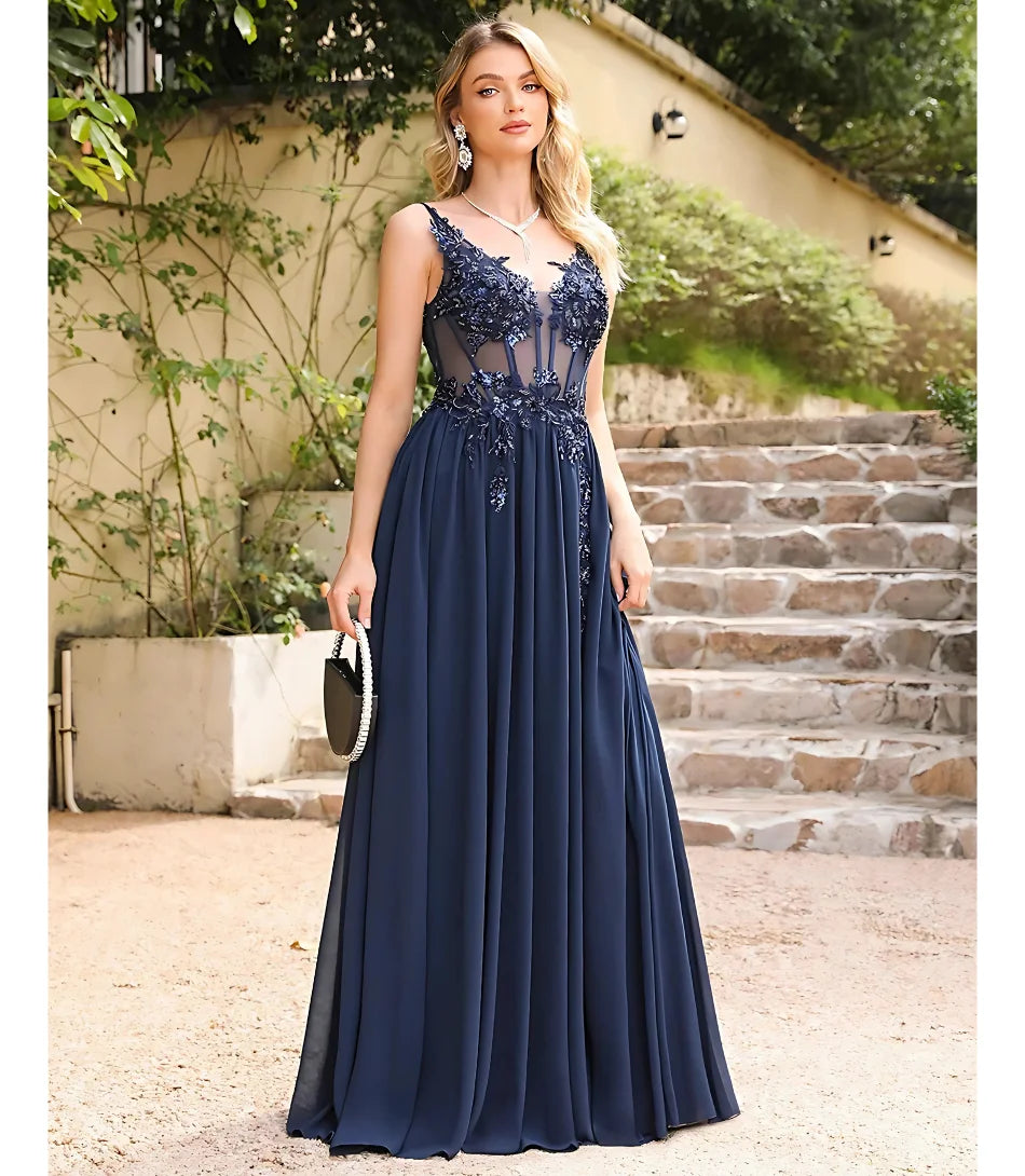 Vestido longo de festa em tule bordado, com transparência sofisticada e bordados florais, disponível na loja Anellimn