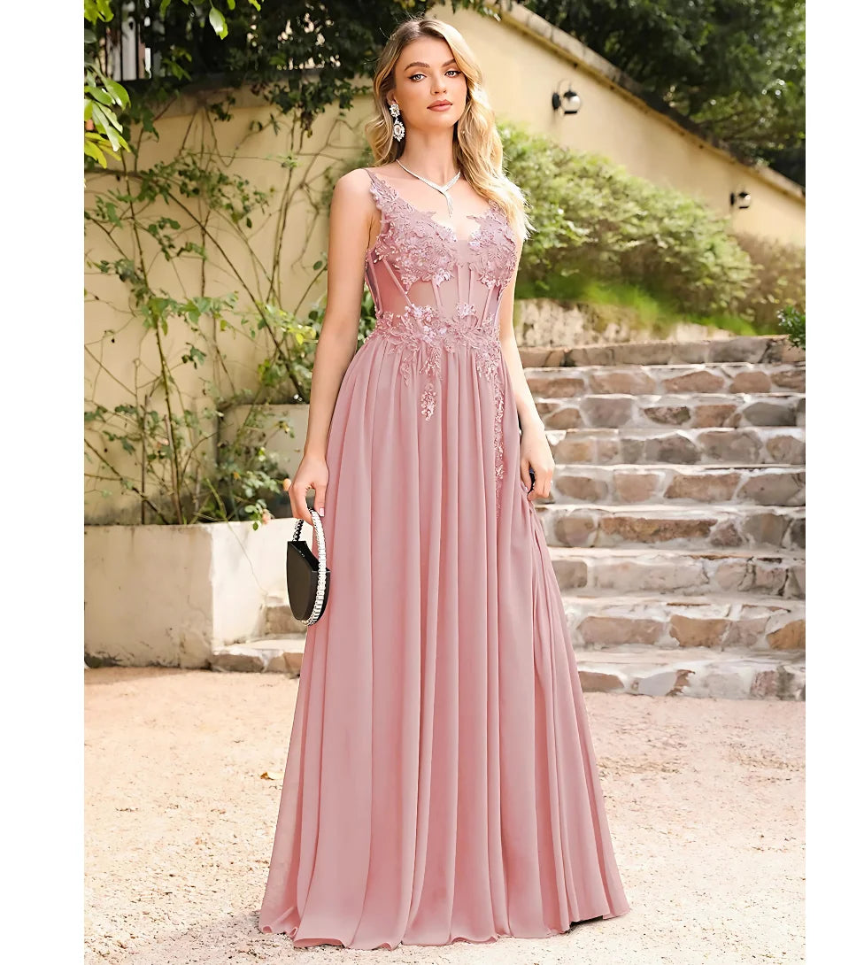 Vestido longo de festa em tule bordado, com transparência sofisticada e bordados florais, disponível na loja Anellimn