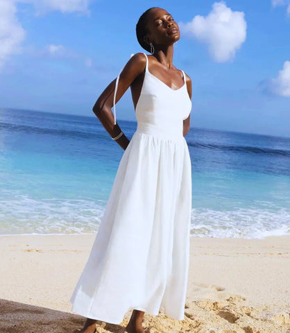 Vestido Linho e algodão leve e respirável Detalhes: Alças ajustáveis, decote reto, corte amplo e fluido Estilo: Boho, ideal para looks casuais e elegantes Comprimento: Longo Ocasiões sugeridas: Praia, eventos ao ar livre, festas diurnas e noturnas