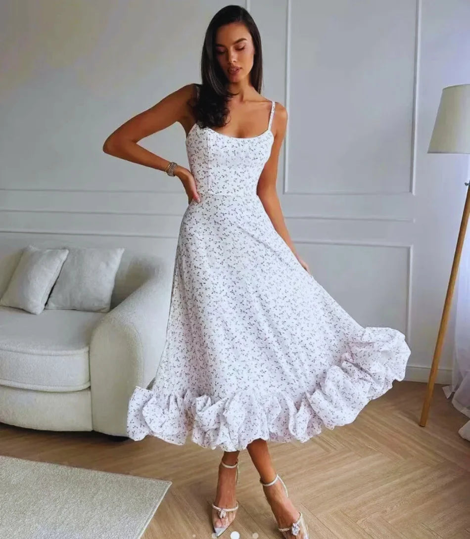 Vestido Midi de Festa com alças, em tecido fluido e design elegante para eventos especiais.