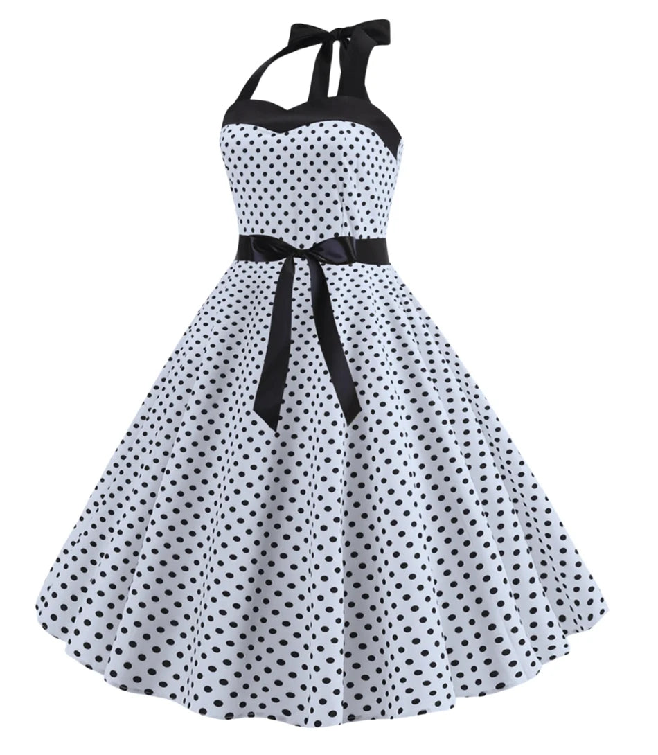 Vestido Vintage de Poá com Laço Feminino, estilo anos 60, elegante e versátil, ideal para eventos especiais.