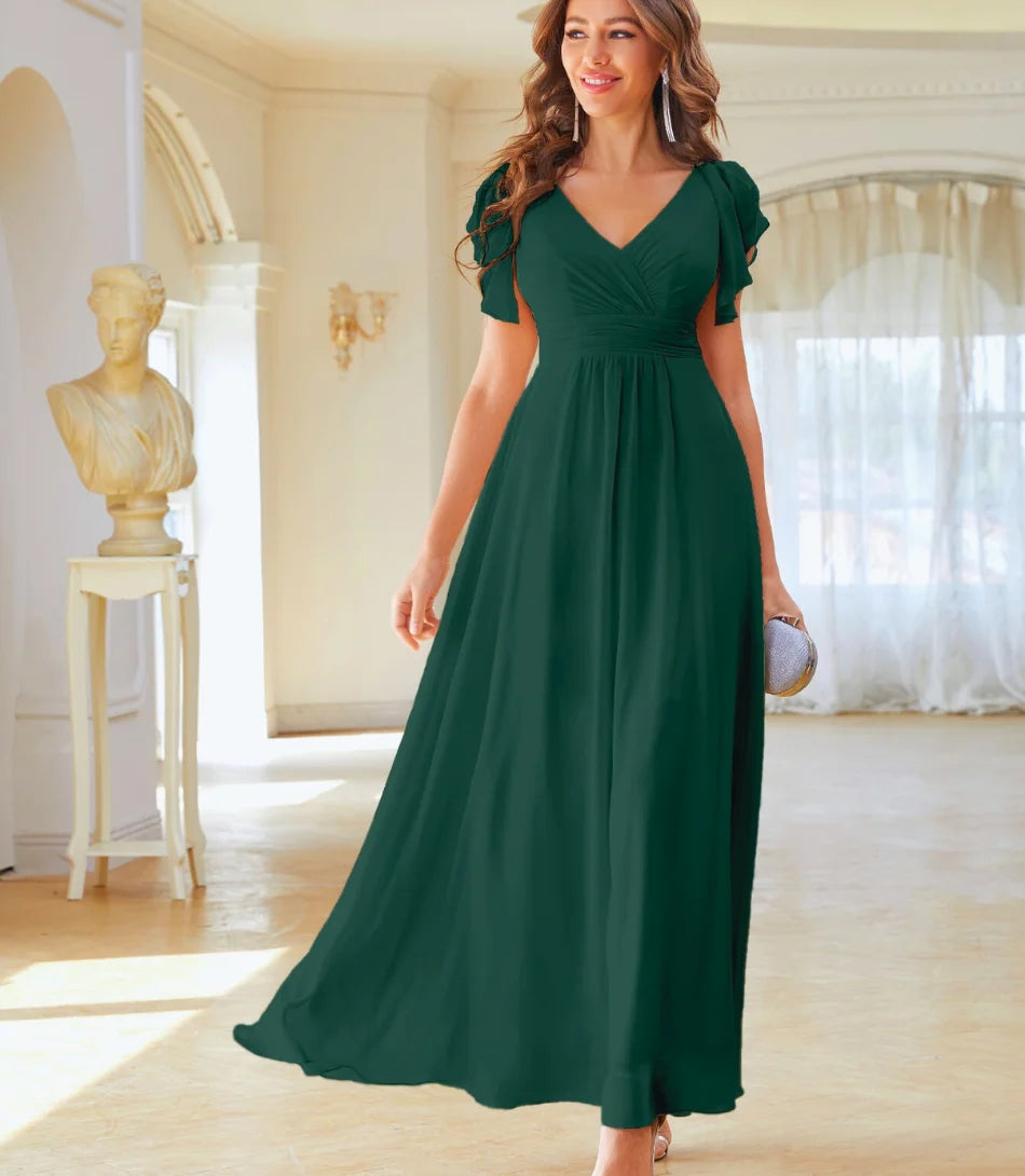 Vestido de festa longo elegante com decote V e mangas delicadas, ideal para eventos formais, em tecido leve e fluido.