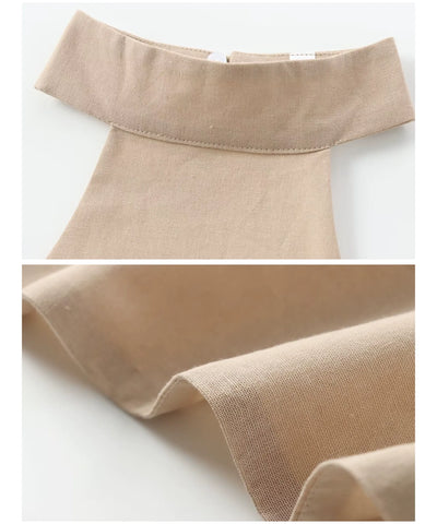 Detalhe da gola e da textura natural do tecido de linho da blusa frente única