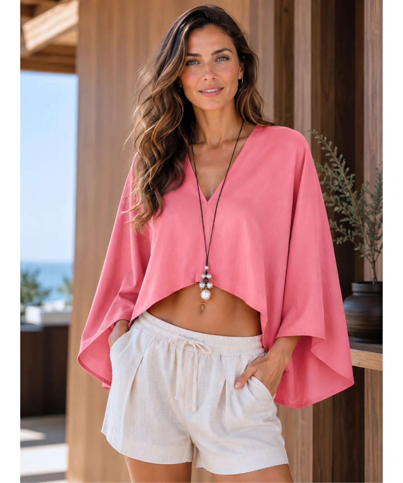 Blusa kimono cropped rosa com manga morcego solta