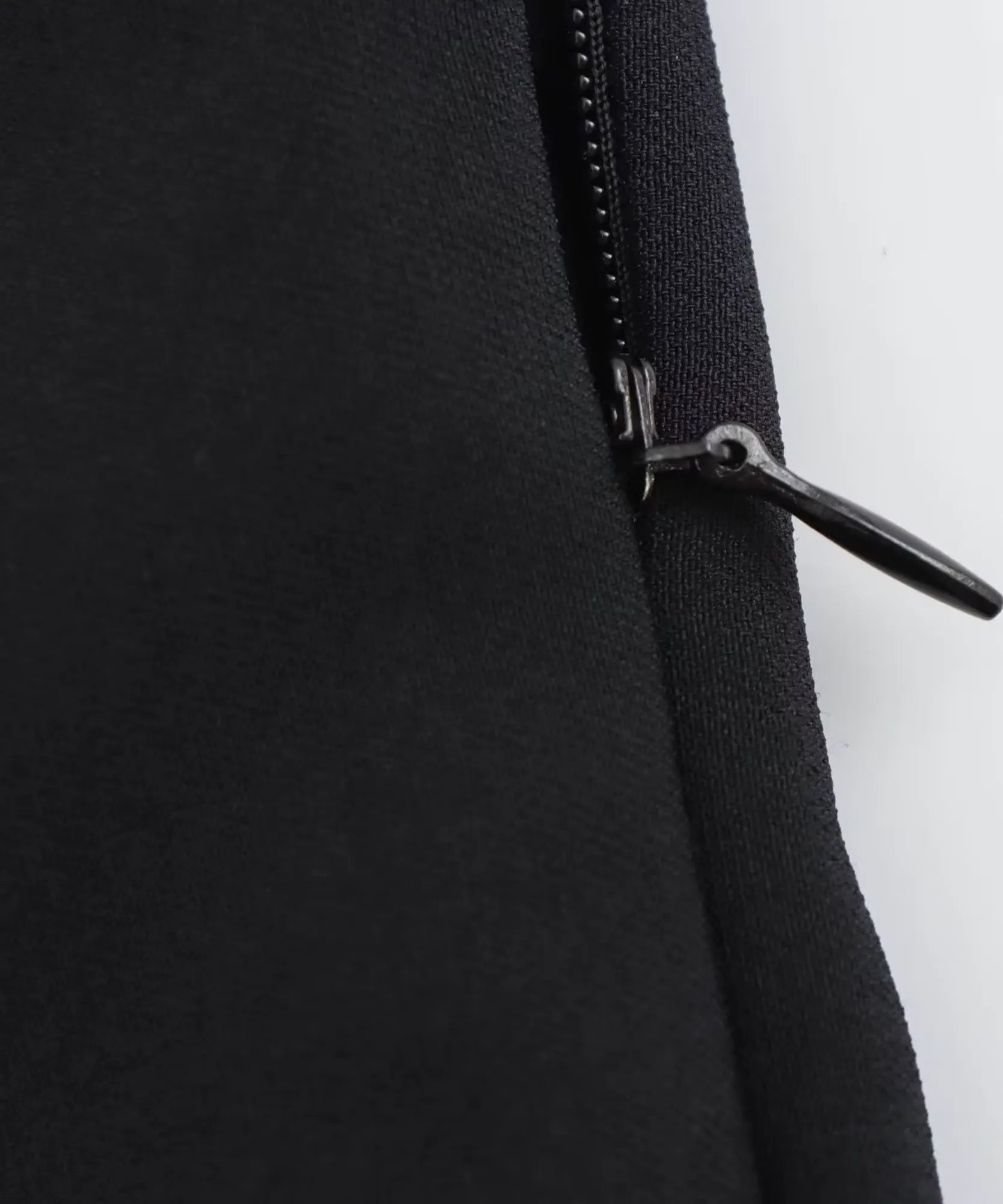 Comprar blusa peplum feminina preta com zíper lateral em promoção Anellimn