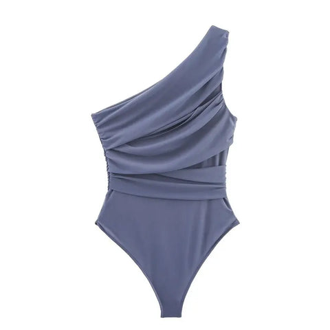 Body azul acinzentado em still, mostrando o caimento da malha e o corte cavado