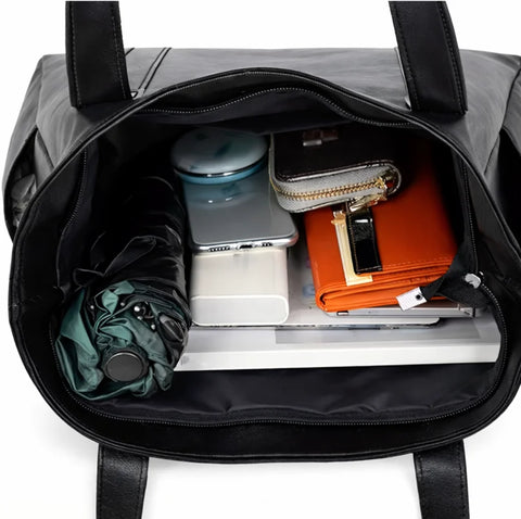Comprar bolsa feminina grande couro sintético tote preta espaçosa para trabalho faculdade e notebook barato ANELLIMN