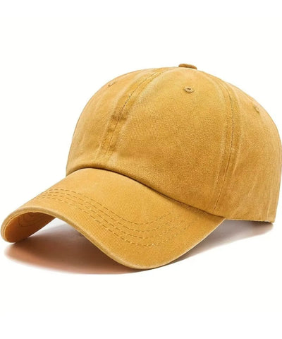 Boné feminino amarelo mostarda estonado fotografado sozinho, mostrando a curvatura da aba