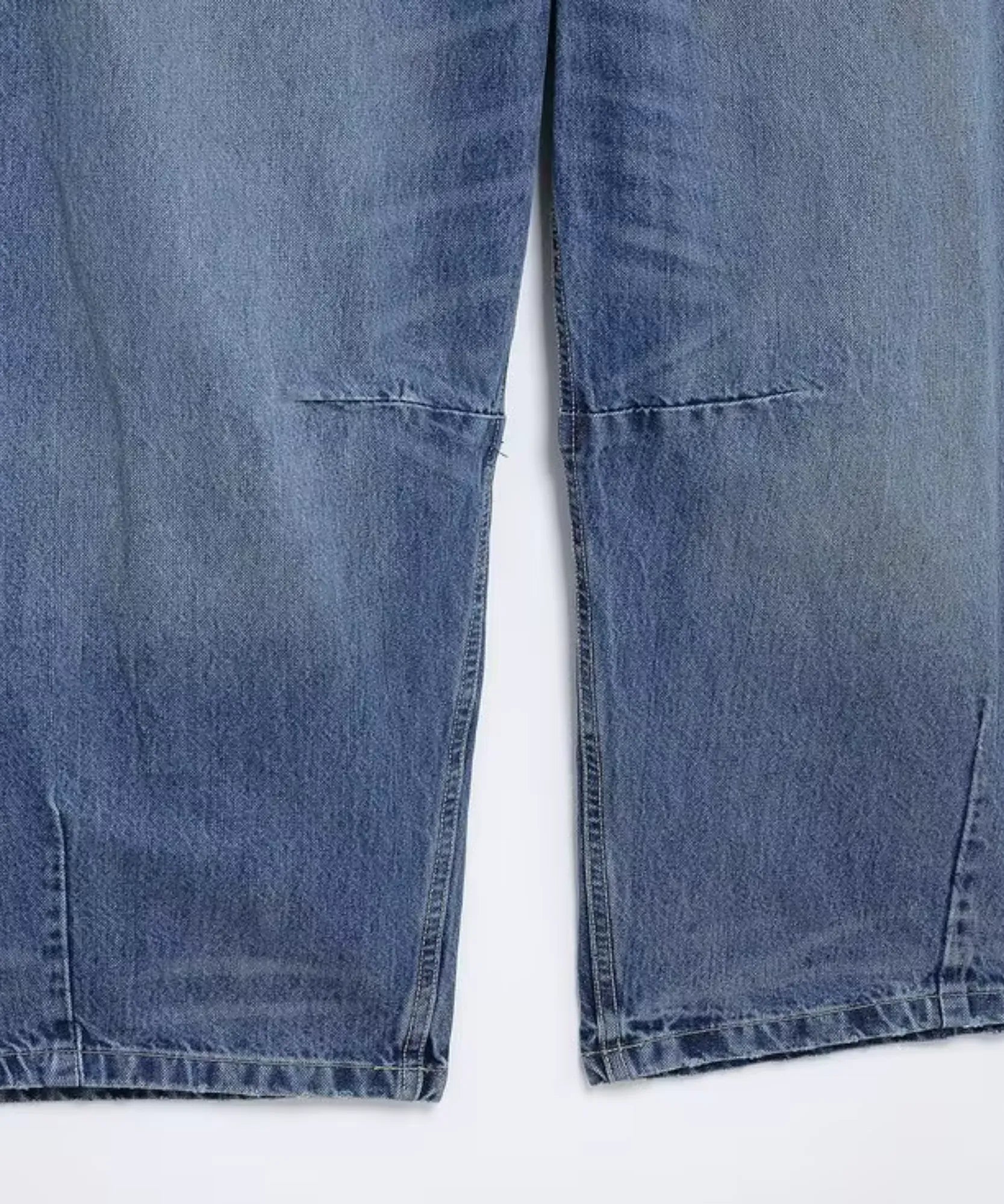 Comprar calça balão feminina jeans detalhe do joelho e barra azul em promoção Anellimn