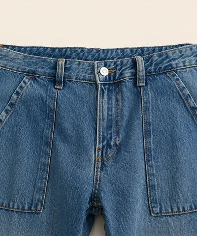 Comprar calça cargo jeans feminina wide leg cintura baixa bolsos laterais barata ou em promoção