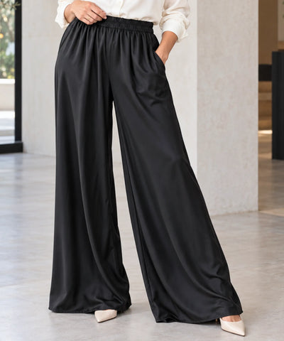 Comprar calça de seda pantalona feminina com bolsos preto em promoção Anellimn